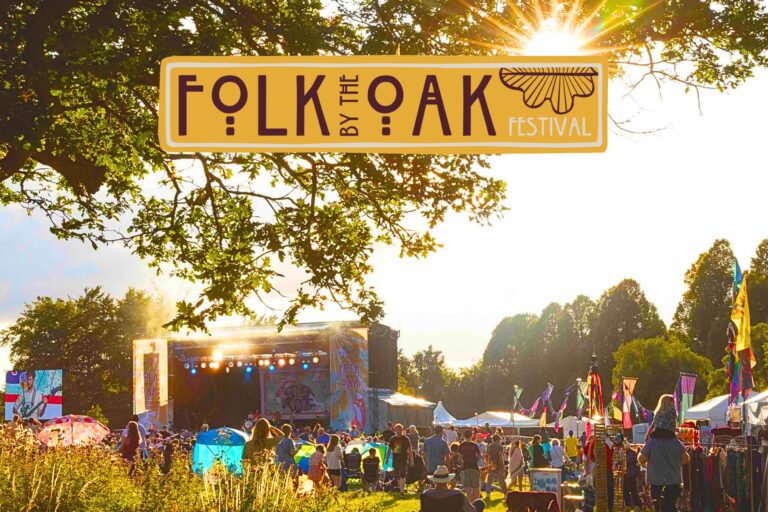 A sunny day at Folk by the Oak logo
