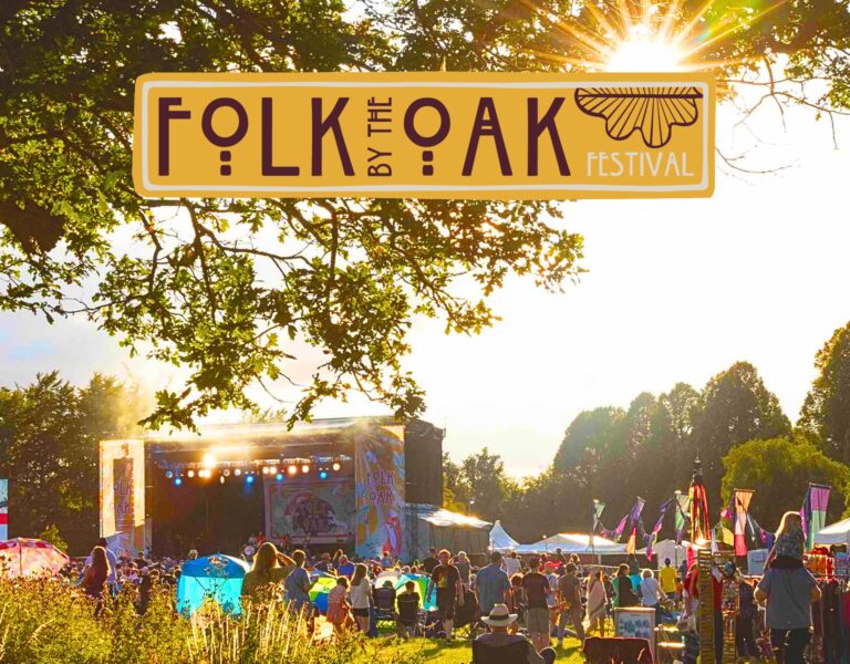 A sunny day at Folk by the Oak logo